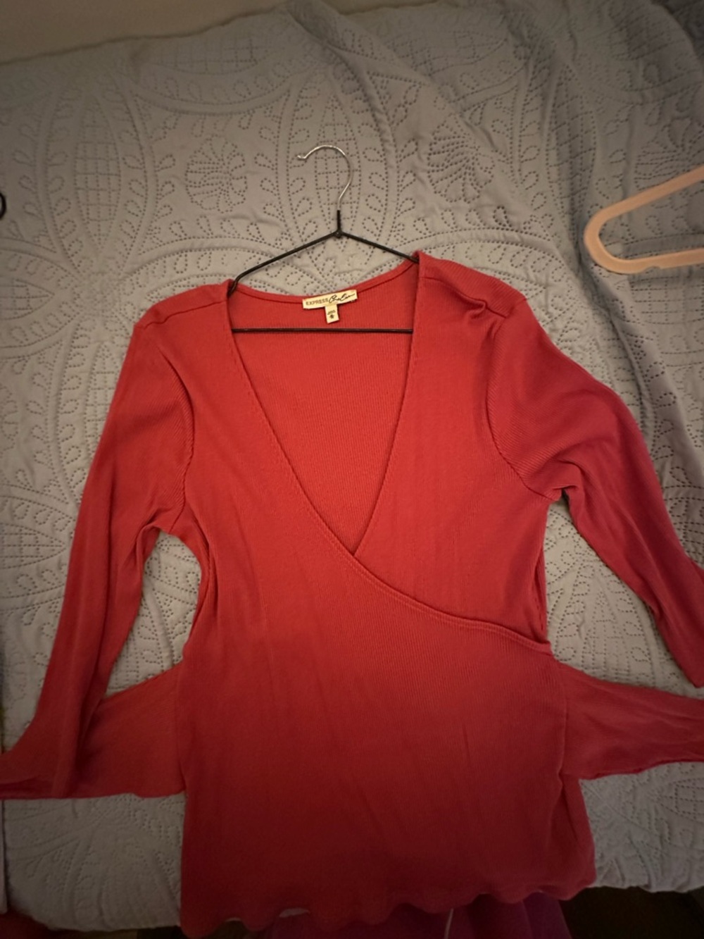 Express Ribbed Wrap-Style Long Sleeve Top in Rust